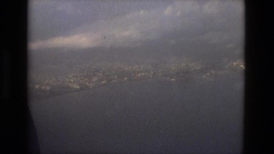 1978: looking at coastal city viewed from airplane above window wings FRANCE