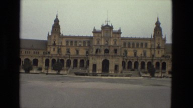 1978: Tourist Area in France with Families and Historic Architecture