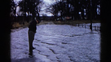 1960: Man Watching Flood Waters Rise Above His Feet Wauconda, Illinois
