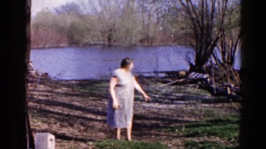 1960: farmer's wife going down to the river to fetch water WAUCONDA, ILLINOIS