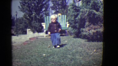 1946: cute blonde kid running summer perfect weather fun day DETROIT, MICHIGAN