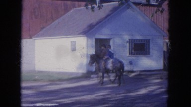1965: couple is riding horses WAUPACA, WISCONSIN