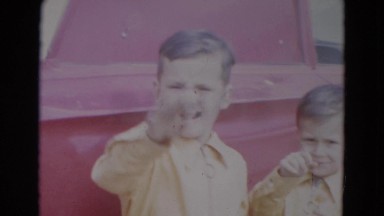 1967: family members gathered outdoor home and beside cars LINCOLN, NEBRASKA