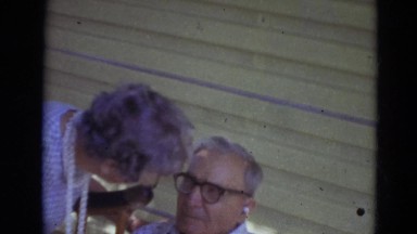1974: An Elderly Couple Share a Whisper in Lincoln, Nebraska
