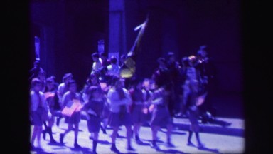 1972: girl scouts marching with american flags LYNBROOK, NEW YORK