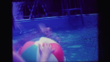 1972: mother and children playing in pool LYNBROOK, NEW YORK