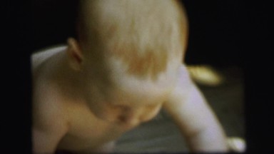 1972: toddlers is seen crawling LYNBROOK, NEW YORK