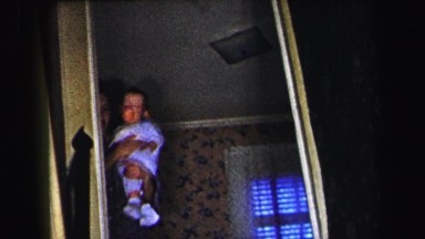 1972: grandmother and the baby walking down the steps LYNBROOK, NEW YORK