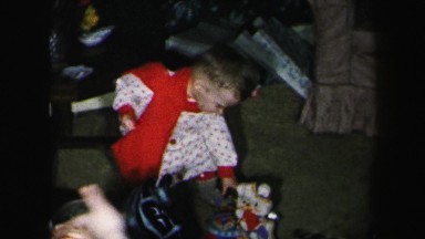 1972: children playing with toys under christmas tree LYNBROOK, NEW YORK