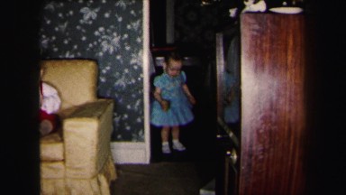 1972: two cute, well dressed toddlers playing with toys LYNBROOK, NEW YORK