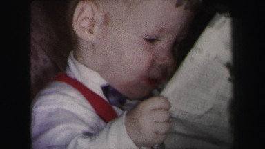 1972: toddlers play with newspaper LYNBROOK, NEW YORK
