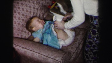 1972: mother with small child is seen LYNBROOK, NEW YORK