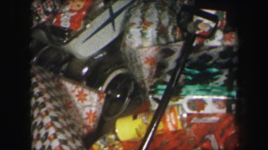 1972: christmas gifts under tree colorful with careful love LYNBROOK, NEW YORK