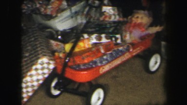 1972: christmas tree with gifts underneath featuring wagon LYNBROOK, NEW YORK