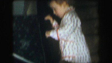 1972: topless kid is seen pouring in pot LYNBROOK, NEW YORK