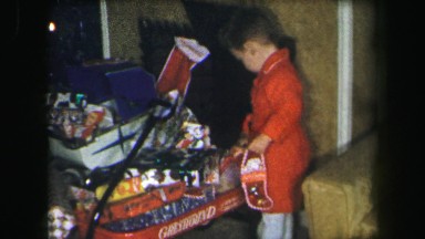 1972: good kids having fun on christmas playing with toys opening LYNBROOK