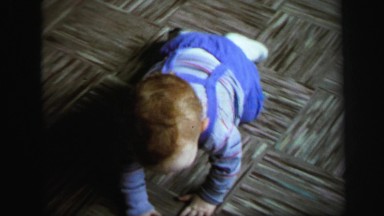 1972: toddlers is seen crawling LYNBROOK, NEW YORK