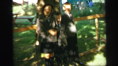1972: school children under tree talks waving the hands LYNBROOK, NEW YORK