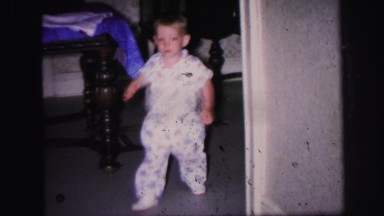 1972: taking the first steps on stage baby showing how child walks this good