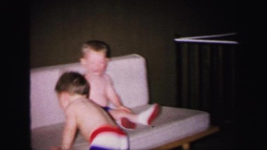 1972: topless kid is seen pouring in pot LYNBROOK, NEW YORK
