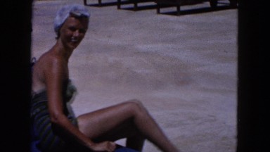 1960: beauty lounging by the pool FLORIDA
