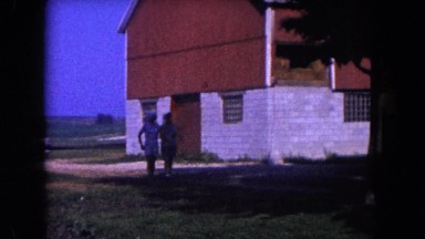 1960: two people walking around a barn FLORIDA