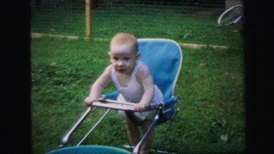 1972: Toddler Girl Crawling on Grass in Lynbrook, New York
