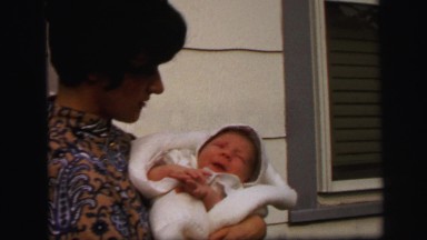 1972: mother with small child is seen LYNBROOK, NEW YORK