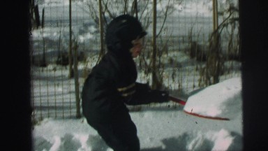 1974: little boys are shoveling the snow LYNBROOK, NEW YORK