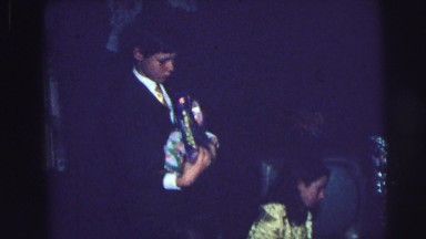 1974: excited children unwrap gifts on christmas morning LYNBROOK, NEW YORK