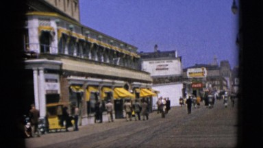 1952: tourism area men walking huge unique road yellow shade CAMDEN, NEW JERSEY