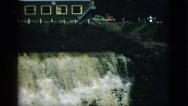 1952: surging water falls from a damn CAMDEN, NEW JERSEY