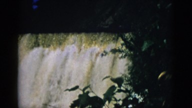 1952: water flowing down from a waterfall. CAMDEN, NEW JERSEY
