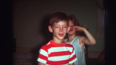 1974: Older Brother and Sister Tormenting Baby Brother in Camden, New Jersey