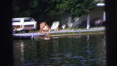 1974: people relaxing near or swimming in lake INDIANA
