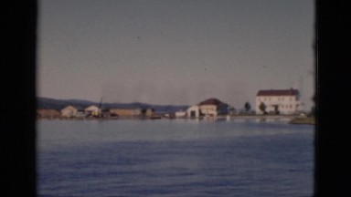 1952: Travelers Walking Across Causeway From Island to Mainland