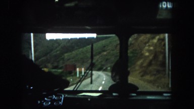 1962: driver in a vehicle moving on highway going through a tunnel HAWAII