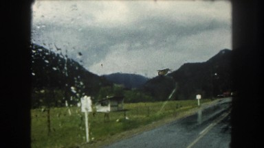 1962: A Beautiful Mountain Ridge Seen Through the Window of a Moving Vehicle