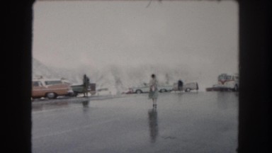 1962: several people across the road in a cold mountainous area COLORADO