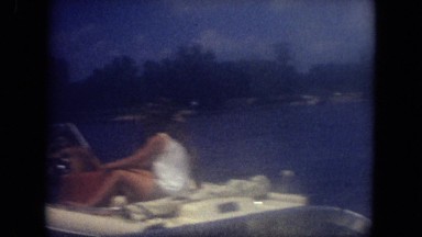 1971: several people enjoying a small boat in summer time MISSISSIPPI