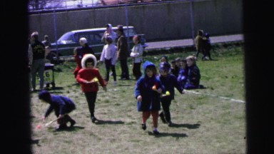 1964: children playing a game with easter eggs CAMDEN, NEW JERSEY
