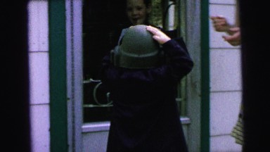 1964: boy with helmet shows off toy CAMDEN, NEW JERSEY
