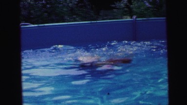 1964: kids swimming in an above ground pool CAMDEN, NEW JERSEY