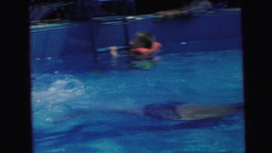 1964: kid swimming pool freestyle move fast water waves CAMDEN, NEW JERSEY