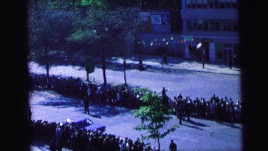 1964: crowds lined up along a broad avenue expecting a parade CAMDEN, NEW JERSEY