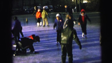 1964: a group of boys practicing skating on the icy ground CAMDEN, NEW JERSEY