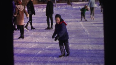 1964: little boy happily ice-skating outdoors CAMDEN, NEW JERSEY