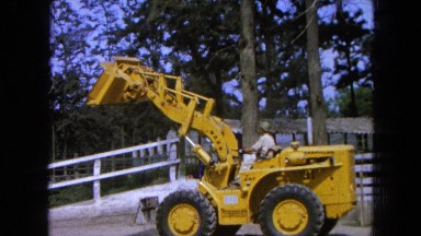 1965: a construction worker demonstrating how to use an excavator Mexico