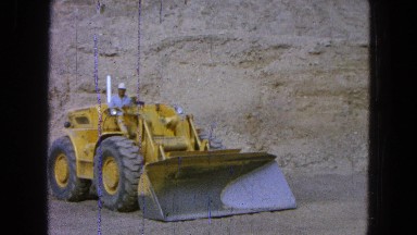 1965: a man operating a large truck or plow on a construction site MEXICO