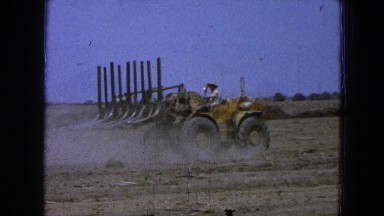 1965: in the farm field a man is working with a tractor MEXICO
